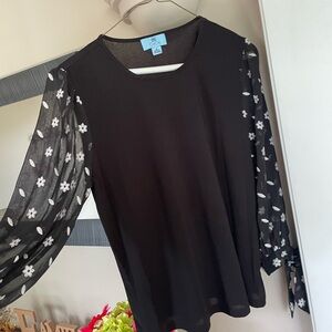 CeCe Black knit top with Sheer Floral Sleeves